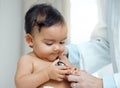 Shes so curious about every little thing. Closeup shot of a paediatrician using a stethoscope during a babys checkup in