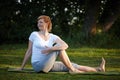 Shes doing her muscles a favor. an attractive woman enjoying a yoga session in the outdoors.