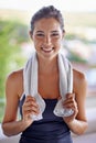 Shes a fitness fanatic. Portrait of an attractive young woman relaxing after a workout.