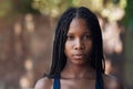 Shes got her game face on. Cropped portrait of an attractive young female athlete standing on the basketball court.