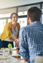 Shes just been promoted. businesspeople shaking hands in an office.