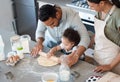 Shes just rolling with it. a couple baking with their toddler at home.