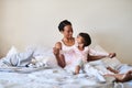 Shes my heart in human form. a beautiful young mother bonding with her little girl in bed at home. Royalty Free Stock Photo