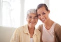 Shes my rock. Portrait of a smiling young woman and her senior mother bonding. Royalty Free Stock Photo