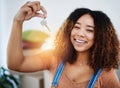 Shes a new home owner. a beautiful young woman holding house keys in her new home. Royalty Free Stock Photo