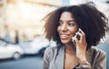 Shes the one everyone wants to talk to. a young businesswoman talking on a cellphone in the city. Royalty Free Stock Photo