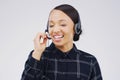 Shes a people person. Studio shot of an attractive young female customer service representative wearing a headset Royalty Free Stock Photo