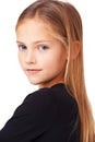 Shes proud and pretty. Head and shoulder portrait of a pretty young girl standing against a white background with arms