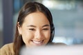 Shes a stellar customer service rep. a young businesswoman using a computer while working in a call centre. Royalty Free Stock Photo