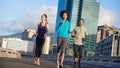 Shes always a step ahead. three young joggers out for a run in the city.