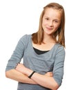 Shes a sweetheart. Studio portrait of a young teenage girl standing against a white background. Royalty Free Stock Photo