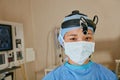 Shes a trusted medical practitioner. Portrait of a confident surgeon standing in an operating room.