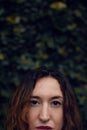 Shes a wild child, a lover of nature. Closeup shot of a beautiful young womans face outside.