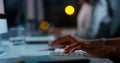 Shes a wizard on the keyboard. an unrecognizable businesswoman working late at night in the office. Royalty Free Stock Photo