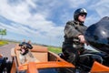 Dog sits with sunglasses in a motorcycle sidecar Royalty Free Stock Photo