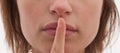 Shh - Cut out of woman with finger to lips