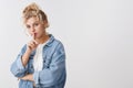 Shh keep secret safe. Portrait sensual mysterious attractive young tender blond woman curly bun hairstyle showing shush Royalty Free Stock Photo