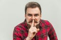 Shh sign. Anger businessman with beard and handlebar mustache Royalty Free Stock Photo