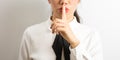 Shhhhh! Businesswoman requiriong silence