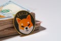 Shiba coin included with Cryptocurrency coin on stack 100 hundred new US dollar Money American Virtual blockchain technology