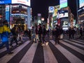 Shibuya, Japan - 7.2.20: Large crowds crossing Shibuya`s famous scramble crossing