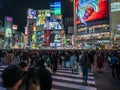 Shibuya, Japan - 7.2.20: Large crowds crossing Shibuya`s famous scramble crossing