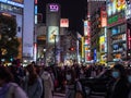 Shibuya, Japan - 7.2.20: Large crowds crossing Shibuya`s famous scramble crossing