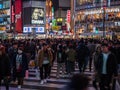 Shibuya, Japan - 7.2.20: Large crowds crossing Shibuya`s famous scramble crossing