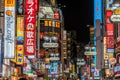 Night scene in Shibuya district. Restaurants and shops with colorful billboards