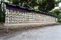 Barrels of Sake are stacked at the entrance to the meiji jingo shrine in Tokyo, Japan