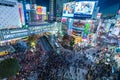 Shibuya, Tokyo, Japan - December 24, 2018: Top view of crowd people pedestrians walking cross zebra crosswalk in Shibuya district