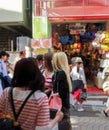 Fashionable japanese teenagers shopping at the so famous Takeshita Street in Harajuku, tokyo, japan