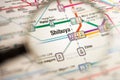 Shibuya Tokyo metro station on a printed metro map under a magnifier lens Royalty Free Stock Photo