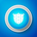 Shield with cyber security brick wall icon isolated on blue background. Data protection symbol. Firewall logo. Network