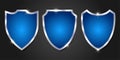 Vector Shining Blue and Grey Metallic Shield Icons in Black Background Royalty Free Stock Photo