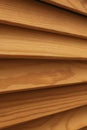 Shield with a large number of parallel wooden logs texture. Wood blinds Royalty Free Stock Photo