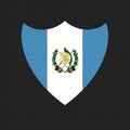 A shield-shaped design features the flag of Guatemala. It has vertical stripes of blue Royalty Free Stock Photo