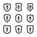 Shields icon set with fleur-de-lis symbol. Heraldic royal design. Vector illustration Royalty Free Stock Photo