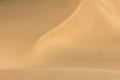 Shifting sand dune contrasts. Desert or beach sand textured background. Royalty Free Stock Photo