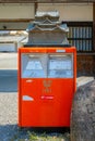 ShigA typical japanese post box with Hikone bronze sculpture on the top