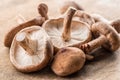 Shiitake mushrooms on the wooden background. Royalty Free Stock Photo