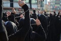 Shiite Muslim women hold up their chained hands. Royalty Free Stock Photo