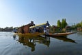 Shikaras, on the Dal Lake in Srinagar, ferrying guests to and fro the houseboats.