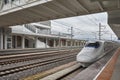 High-speed train departs from Shilin station. Royalty Free Stock Photo