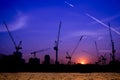 Shillouette contruction and cranes beside the Rive Royalty Free Stock Photo