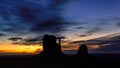 Shilouette of Monument Valley at sunrise, Arizona