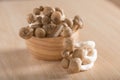 Shimeji mushrooms brown varieties in wood cup.