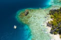 Shimizu Island, El Nido, Palawan, Philippines. Beautiful aerial view of tourist boat on trip close to tropical island Royalty Free Stock Photo