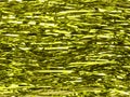 Shimmer shiny yellow tinsel background Royalty Free Stock Photo