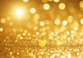 A shimmering abstract background with a golden bokeh effect. The image features bright, circular Royalty Free Stock Photo